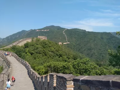 Vacation Packages Tricks: How Can Fly More For Less? : Walking on the Great wall of China near Beijing, China with a vacation package